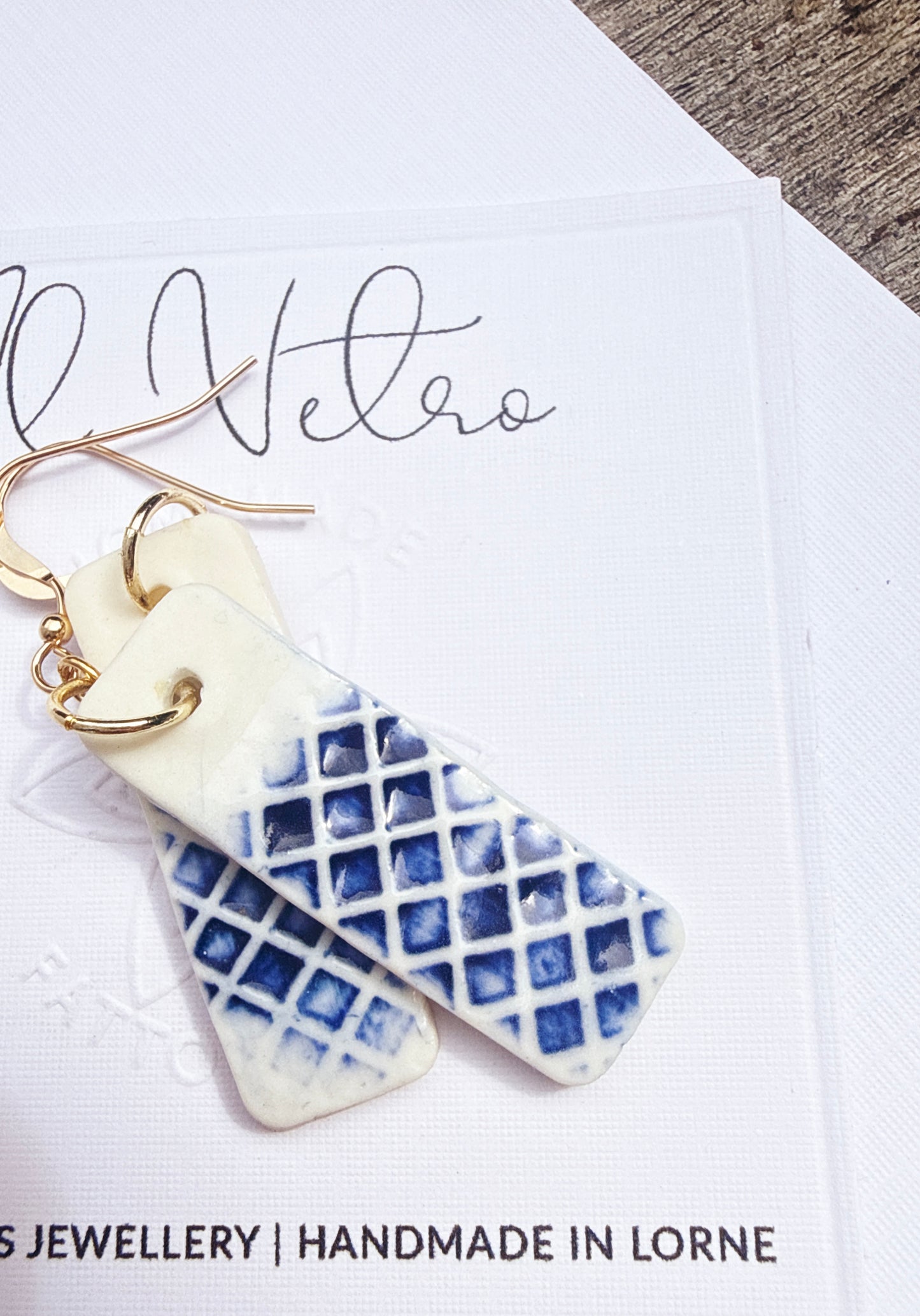 Porcelain rectangle checked earring in cobalt blue on card