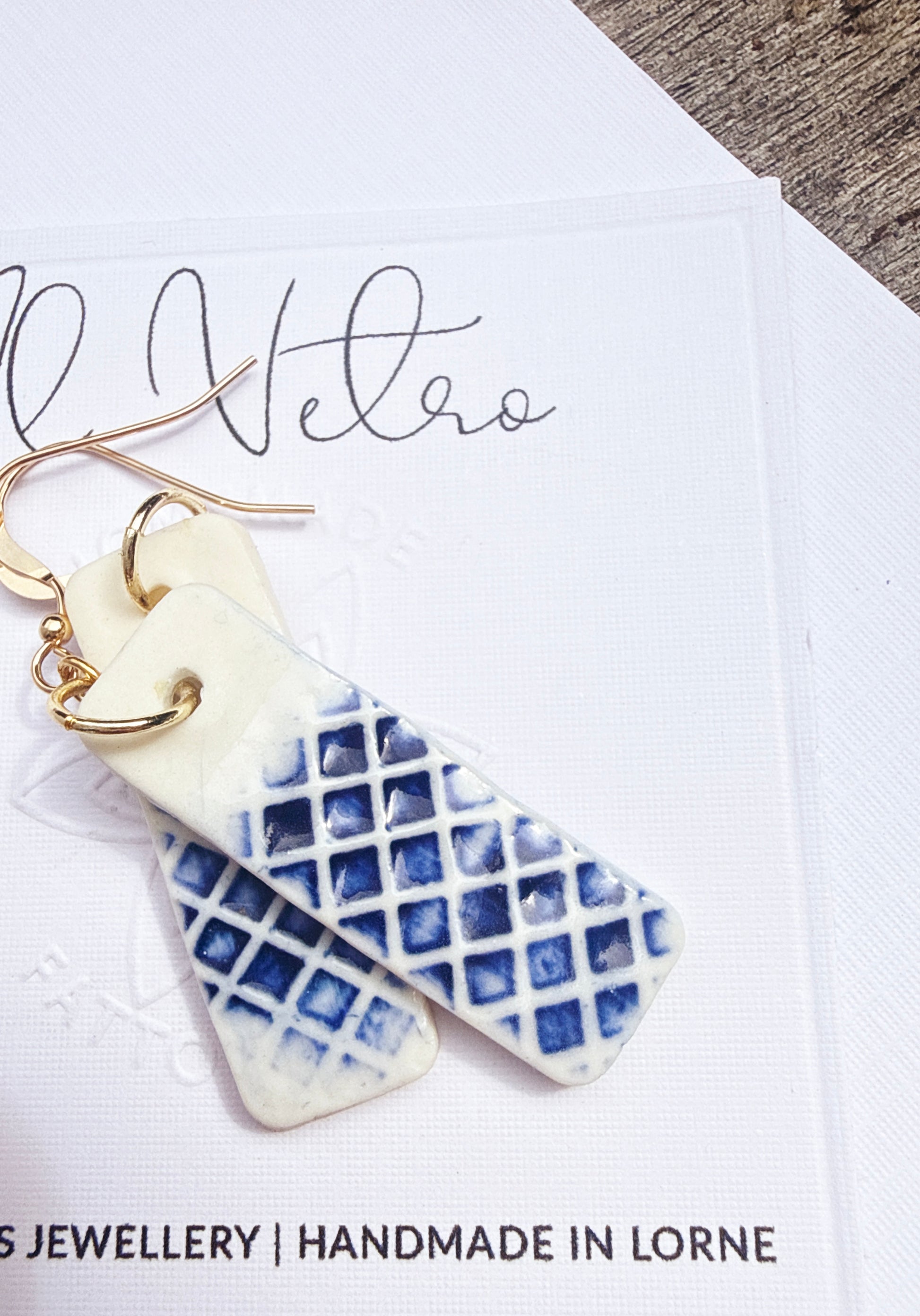 Porcelain rectangle checked earring in cobalt blue on card